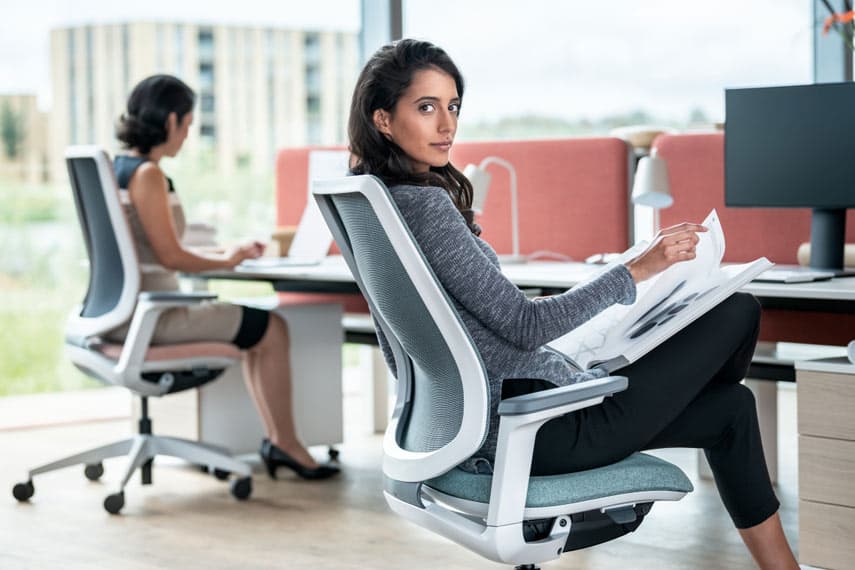 Comfortable mesh back task chair in office