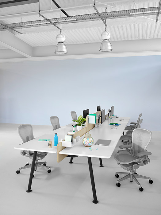Light grey Aeron office chairs at Memo desk