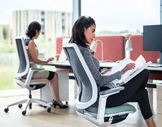 Mesh chair with upholstered seat pad